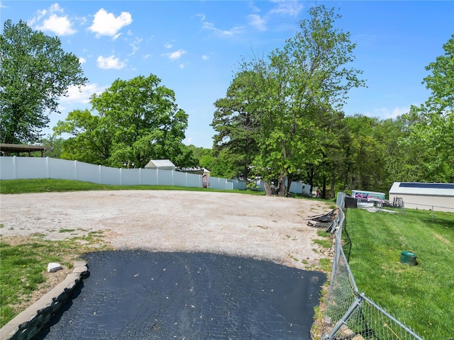 view of yard featuring fence