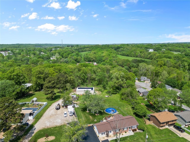 aerial view featuring a view of trees