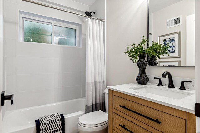 bathroom with visible vents, shower / bathtub combination with curtain, toilet, and vanity