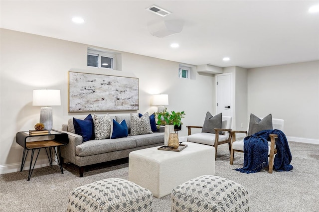 carpeted living room featuring baseboards, recessed lighting, and visible vents