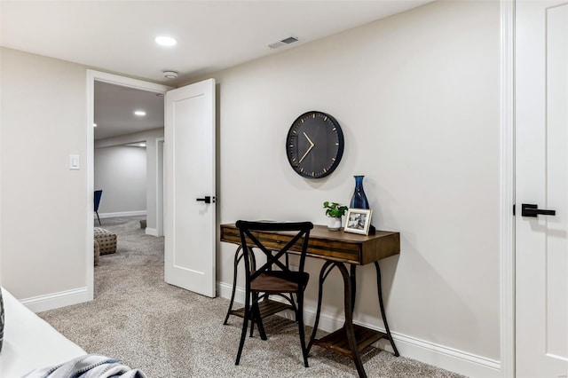 office area with visible vents, recessed lighting, baseboards, and light carpet