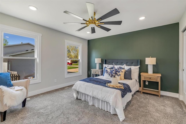 carpeted bedroom with recessed lighting, baseboards, and ceiling fan
