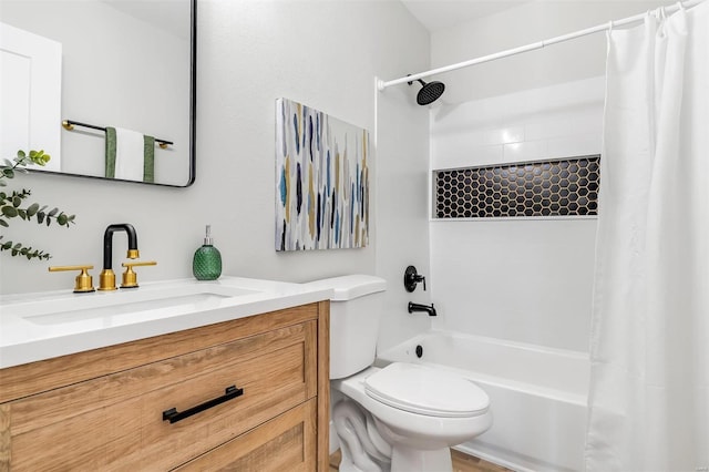 full bathroom featuring vanity, toilet, and shower / tub combo