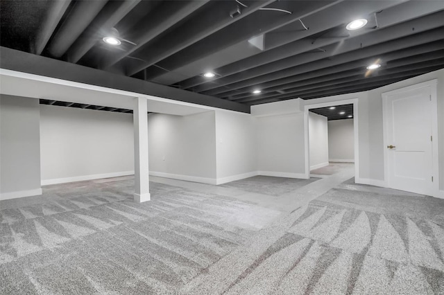 finished below grade area with baseboards and carpet