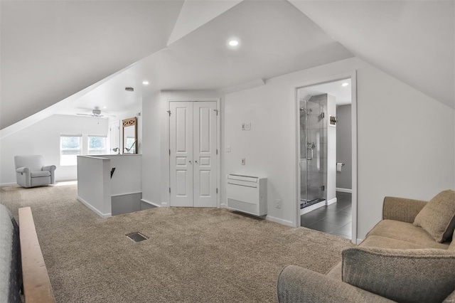 interior space with carpet floors, baseboards, and visible vents