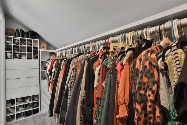 spacious closet featuring carpet and lofted ceiling