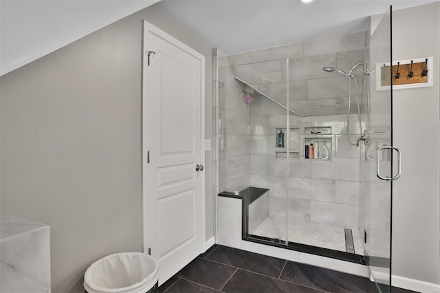 full bath with tile patterned floors and a stall shower