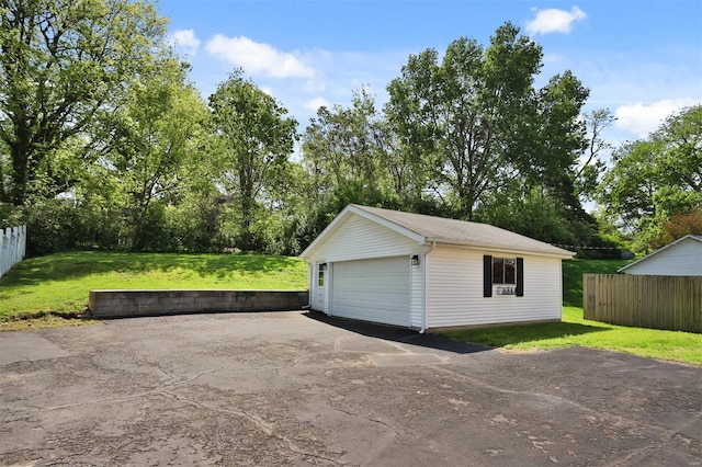 detached garage with fence