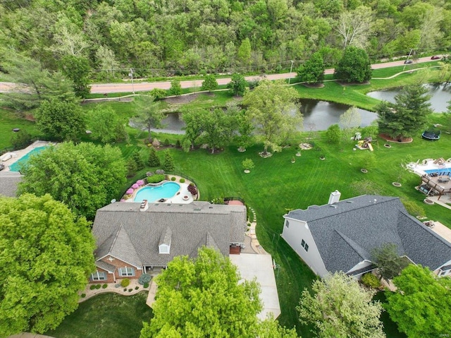 drone / aerial view with a water view