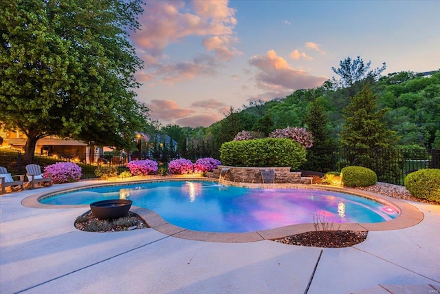 view of swimming pool with a fenced in pool, a patio area, and fence