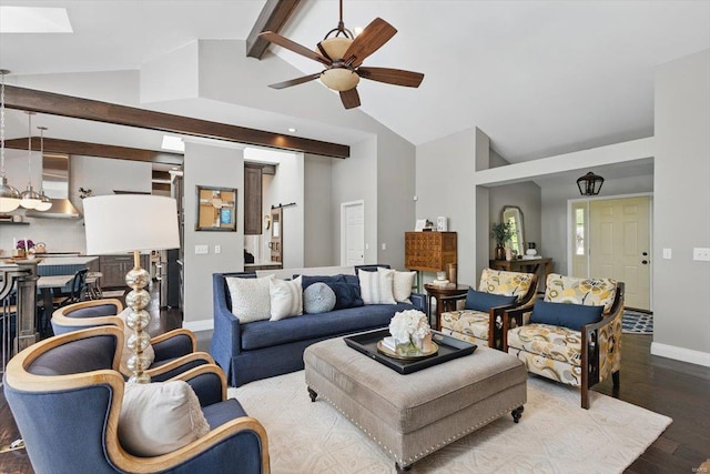 living room with ceiling fan, beam ceiling, high vaulted ceiling, baseboards, and wood finished floors