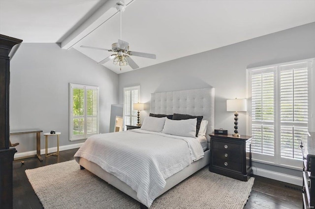 bedroom with ceiling fan, baseboards, dark wood finished floors, and vaulted ceiling with beams