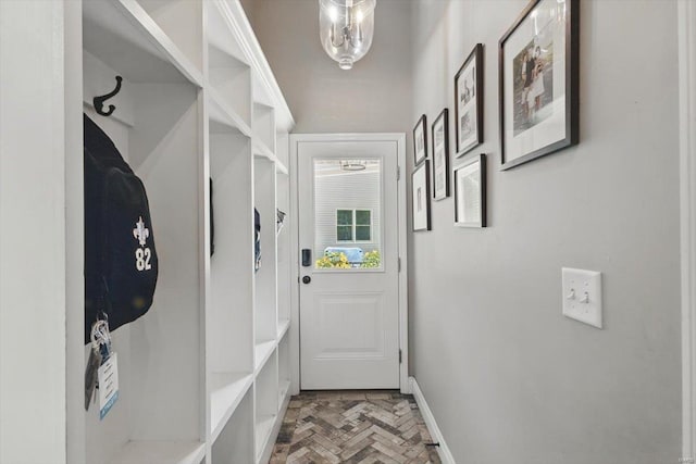 mudroom featuring baseboards
