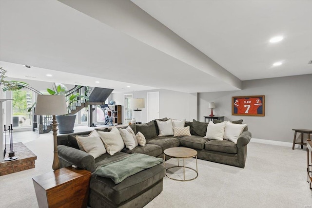 living area with carpet floors, baseboards, and recessed lighting