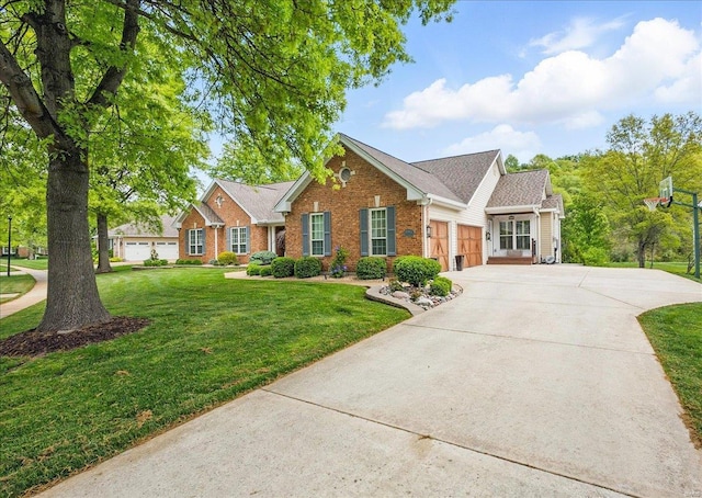 ranch-style home featuring concrete driveway, brick siding, a front yard, and a garage