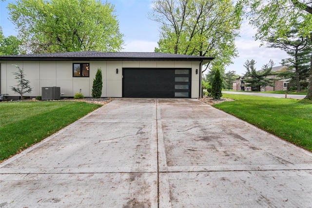 exterior space with driveway and central AC unit