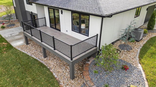 wooden deck with central AC unit