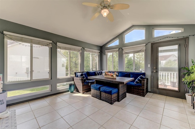 sunroom / solarium featuring ceiling fan and an outdoor living space