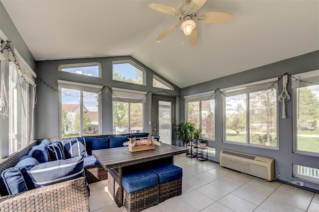 sunroom with plenty of natural light, an AC wall unit, an outdoor hangout area, and lofted ceiling