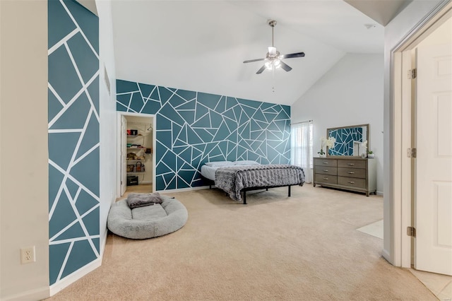 carpeted bedroom featuring ceiling fan and high vaulted ceiling