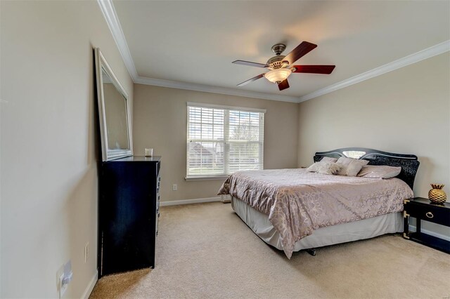 bedroom with light colored carpet and ornamental molding