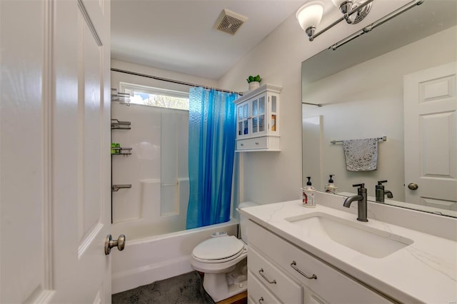 full bathroom with visible vents, shower / bath combo with shower curtain, toilet, and vanity