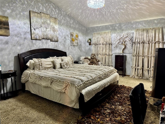 bedroom with carpet flooring and lofted ceiling