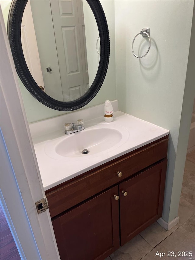 bathroom with vanity and tile patterned floors