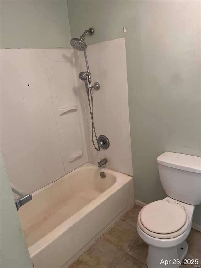 full bathroom featuring toilet, baseboards, bathing tub / shower combination, and tile patterned floors
