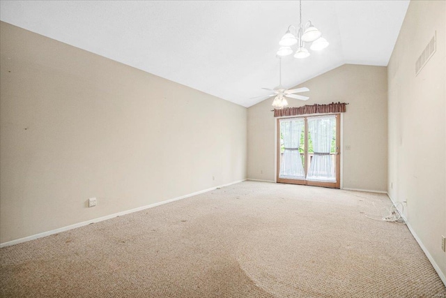 unfurnished room featuring visible vents, lofted ceiling, light carpet, baseboards, and ceiling fan with notable chandelier