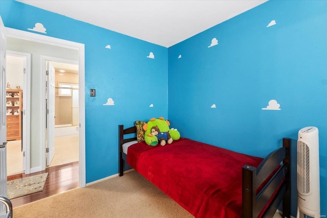 bedroom featuring baseboards