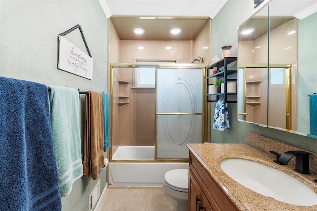 full bath featuring crown molding, shower / bath combination with glass door, vanity, toilet, and tile patterned floors