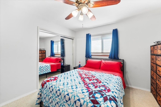 bedroom featuring a closet, carpet, ceiling fan, and baseboards