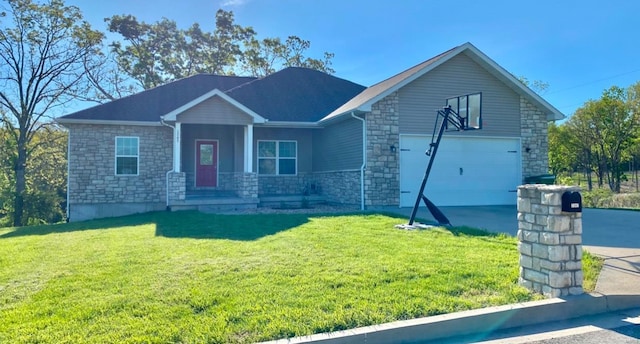 view of front of house with stone siding, a front lawn, and driveway