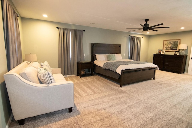 bedroom with recessed lighting, ceiling fan, and light carpet