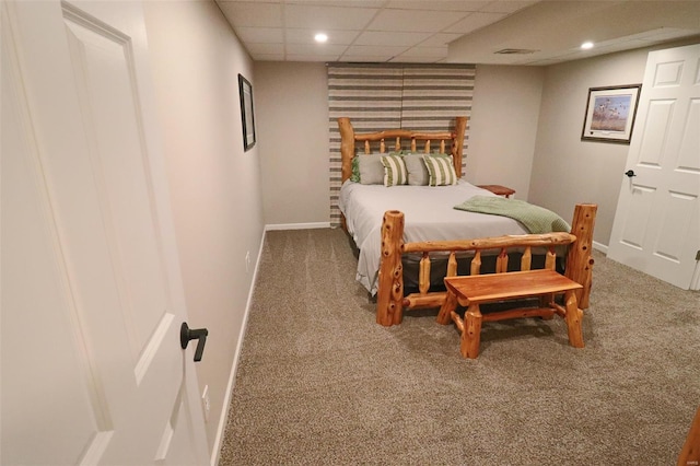 bedroom featuring carpet floors, recessed lighting, baseboards, and a paneled ceiling