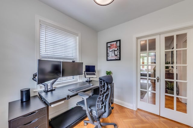 home office with baseboards and french doors