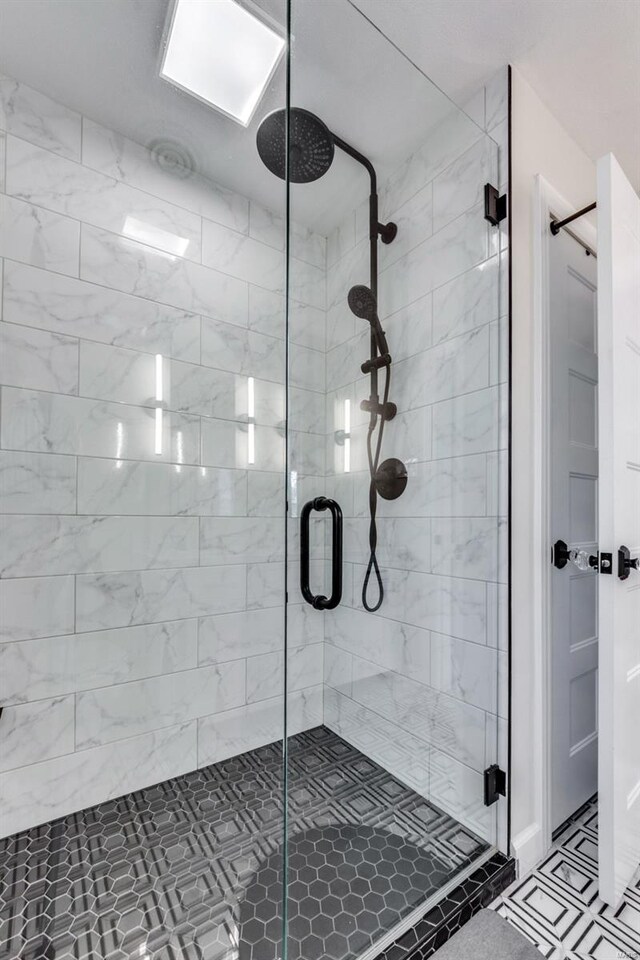 full bathroom with a shower stall