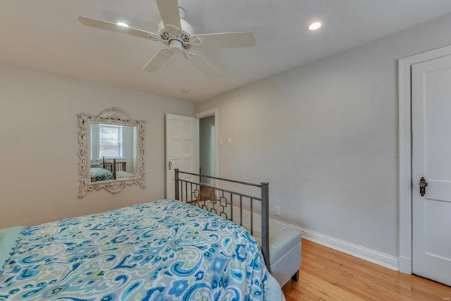 bedroom with baseboards, recessed lighting, light wood finished floors, and ceiling fan