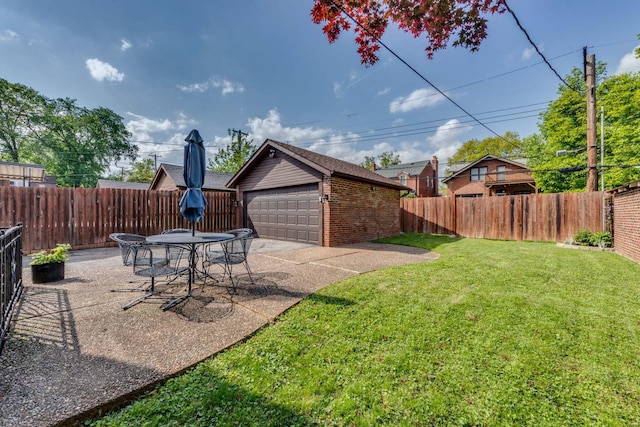 view of yard featuring an outdoor structure, a fenced backyard, a patio, and a detached garage