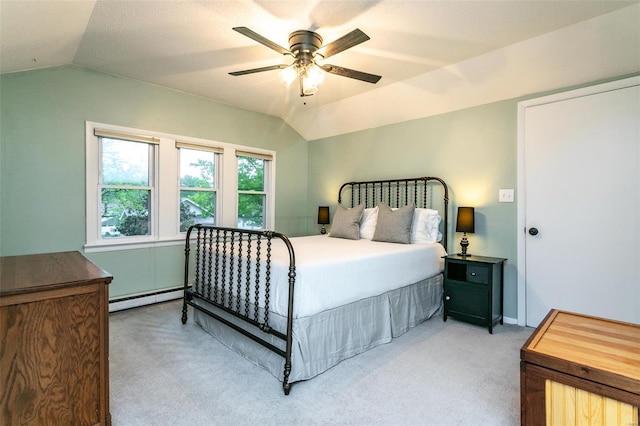 bedroom featuring vaulted ceiling, a ceiling fan, light carpet, and a baseboard heating unit