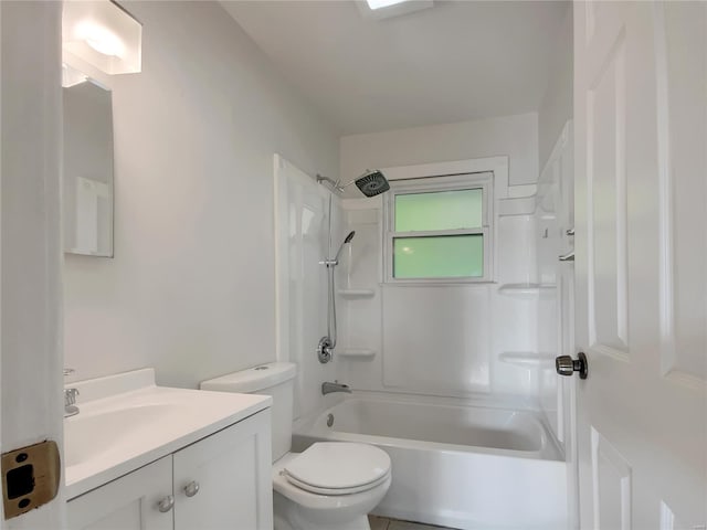 bathroom with toilet, shower / bathing tub combination, and vanity