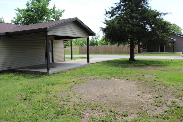 exterior space featuring a patio and fence