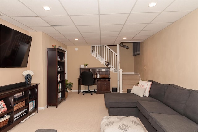 living area with recessed lighting, light carpet, and stairway