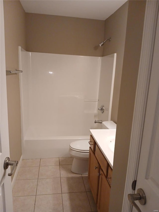 bathroom with toilet, tile patterned floors, bathtub / shower combination, and vanity