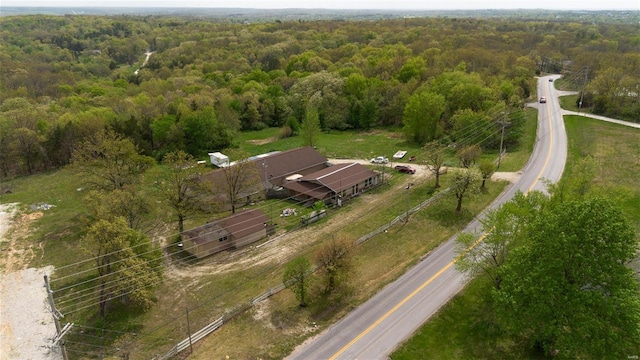 bird's eye view featuring a forest view