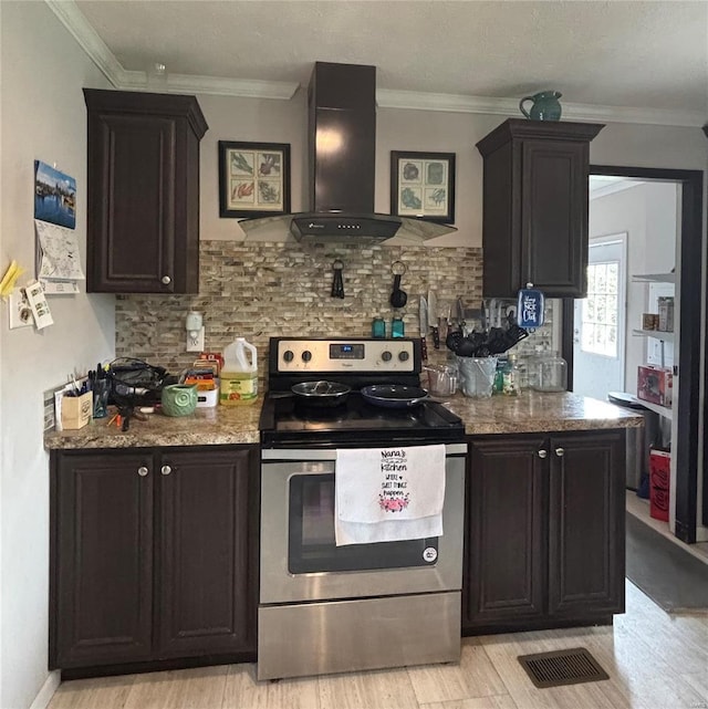 kitchen featuring tasteful backsplash, ventilation hood, visible vents, light wood-type flooring, and stainless steel electric stove