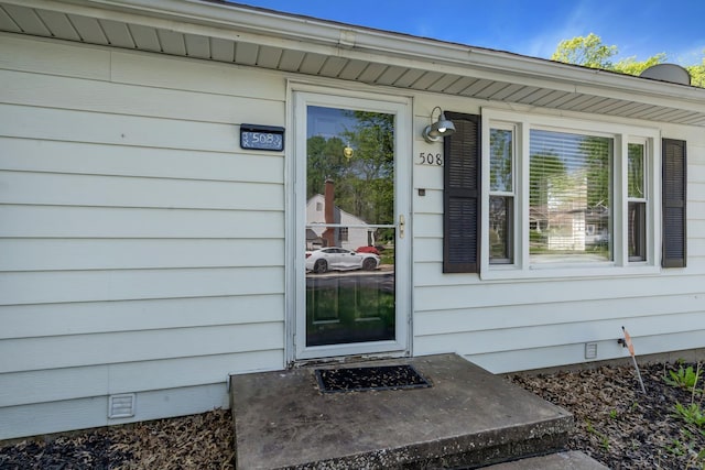 doorway to property featuring crawl space