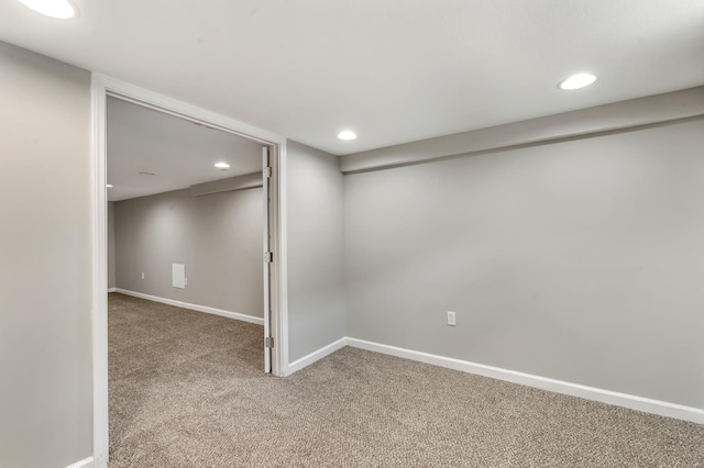 finished basement featuring baseboards, recessed lighting, and carpet