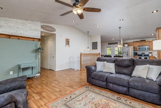 living area featuring recessed lighting, light wood-style flooring, ceiling fan, and lofted ceiling